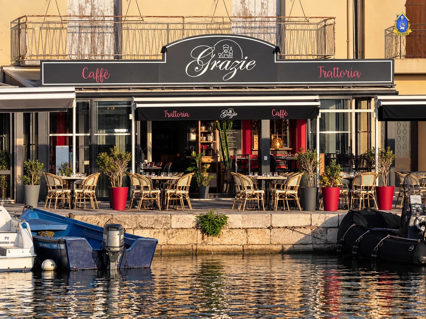 Terrace of Grazie restaurant at Mèze harbour
